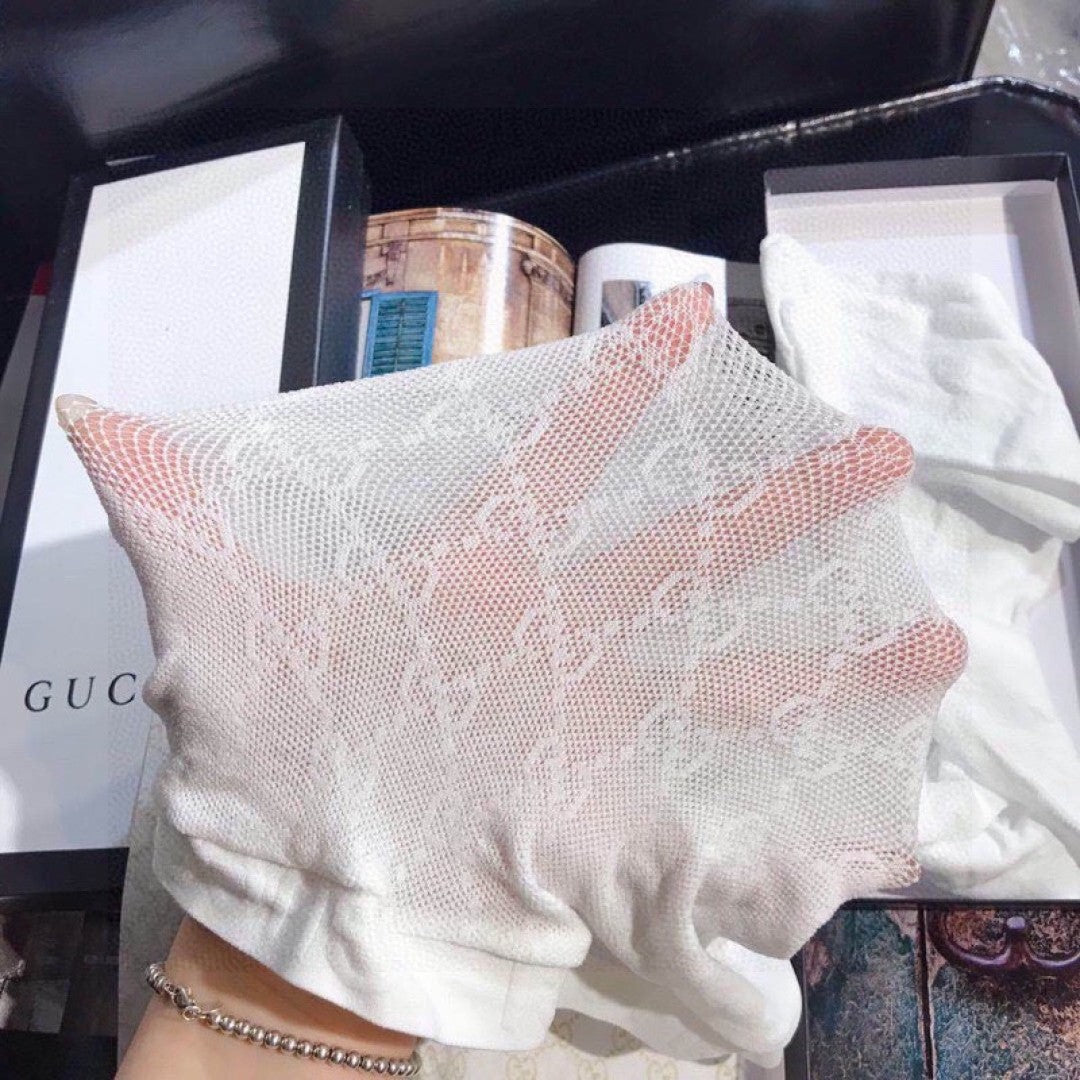 Guc One-piece fishnet pants