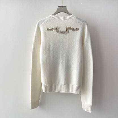 Cashmere sweater with lucky star embroidery