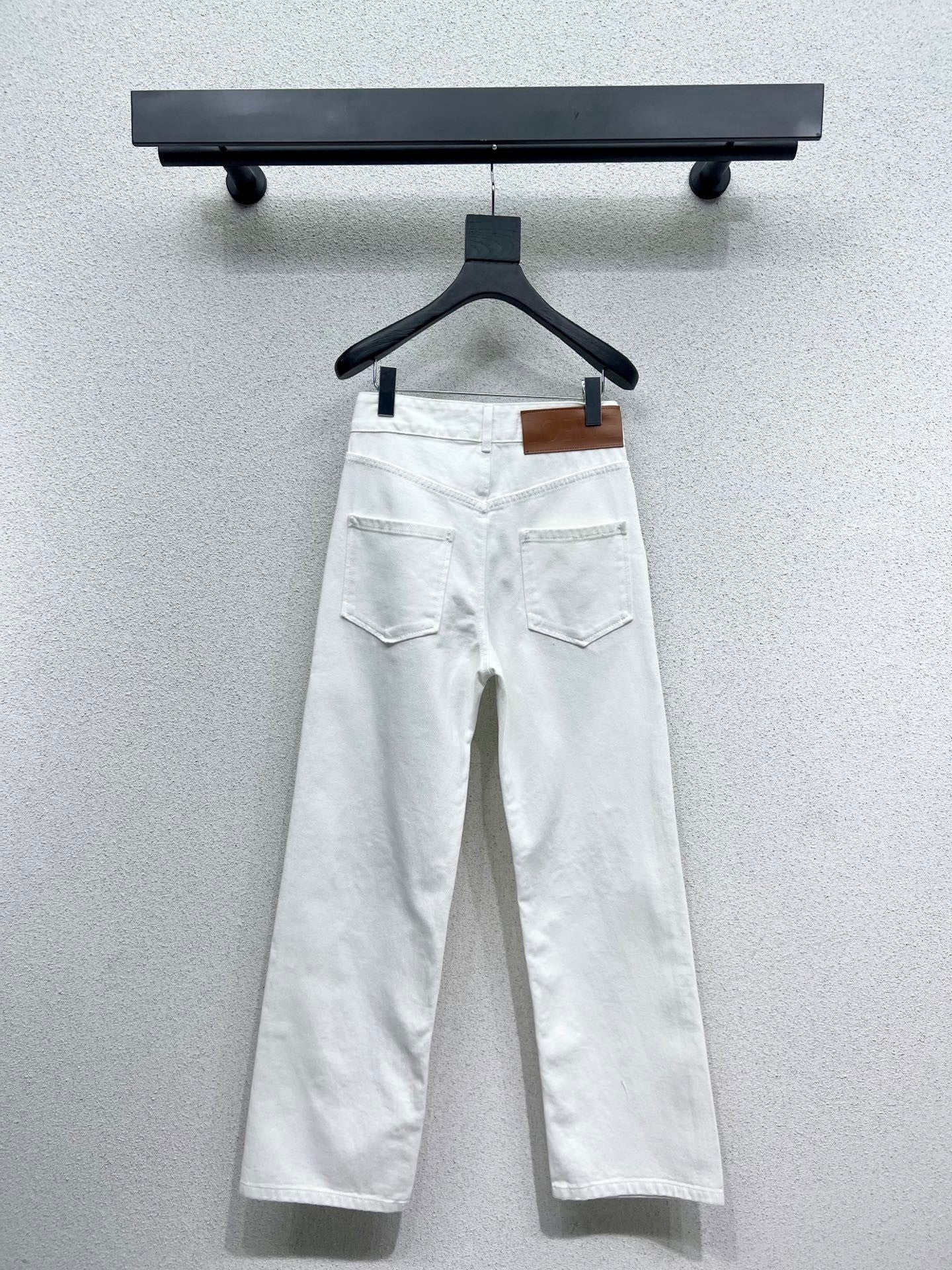 White jeans with logo on waist