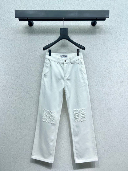 White jeans with logo on waist