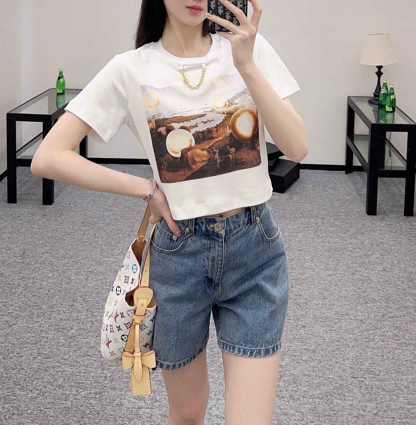 New product promotion. Walking on the street in a fashionable white T-shirt. Beautiful heart!