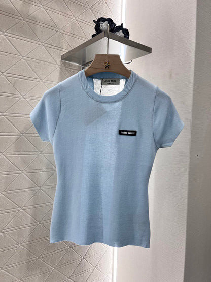 👚New product promotion. Walking on the street in a fashionable light blue T-shirt. Beautiful heart!