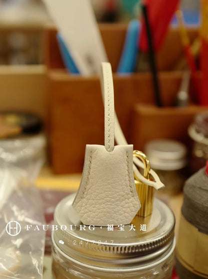 Hand-sewn kelly/TOGO leather white