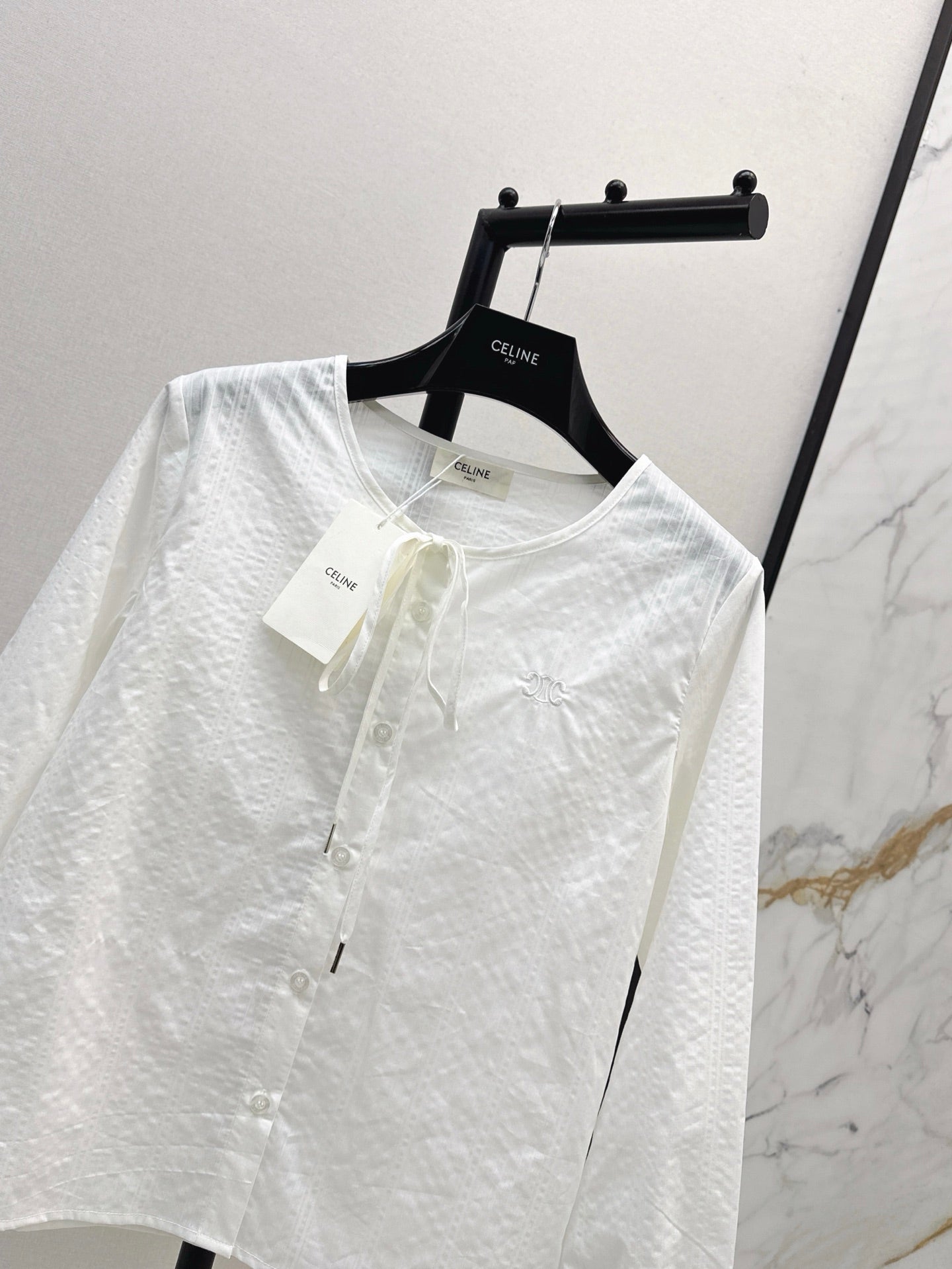 Ce1n NEW button shirt