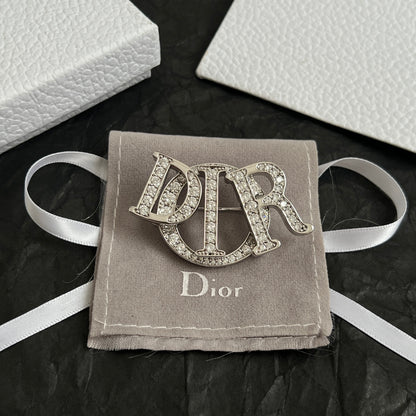 CD New Alphabet brooch