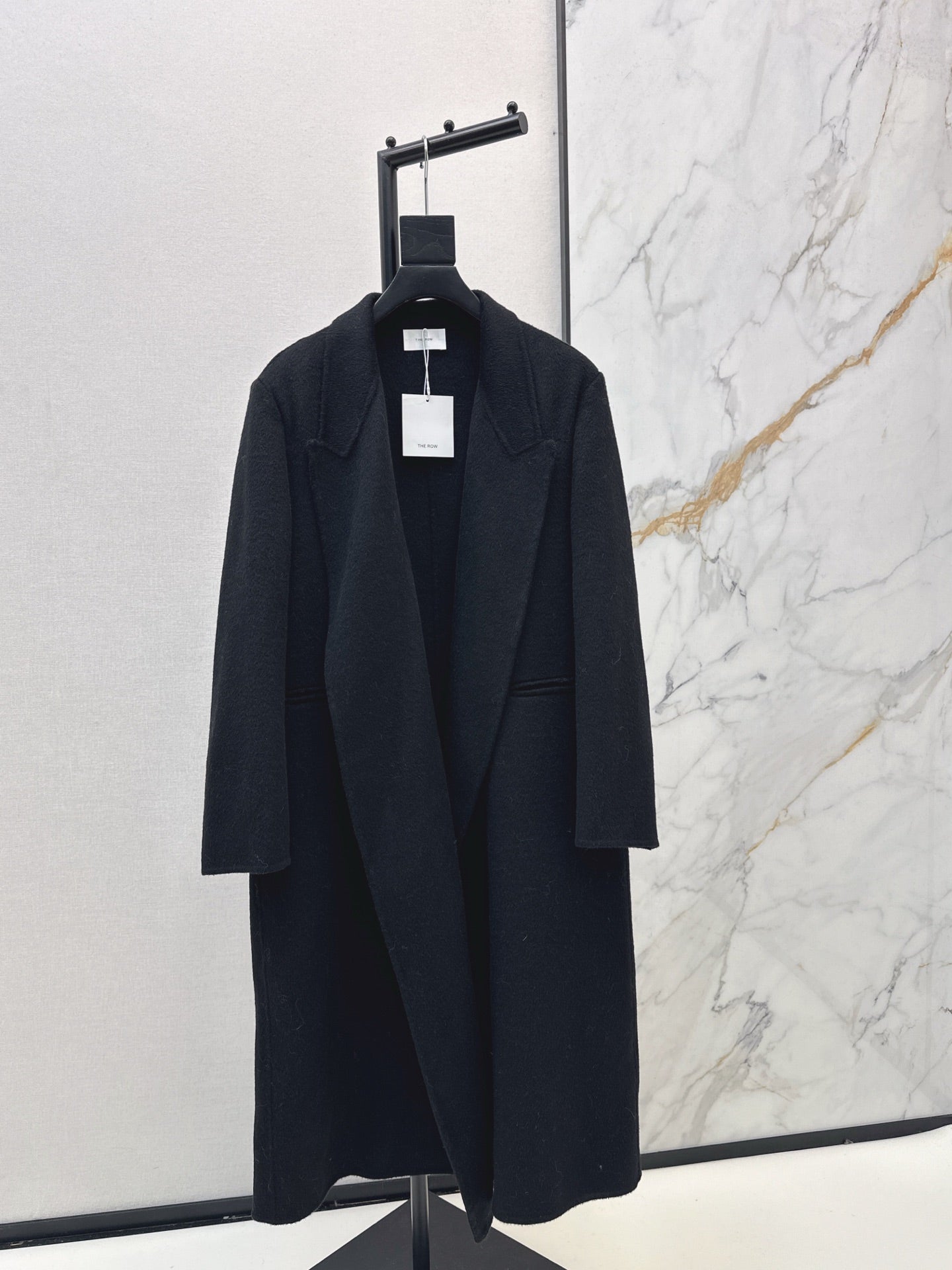 Row NEW woolen overcoats