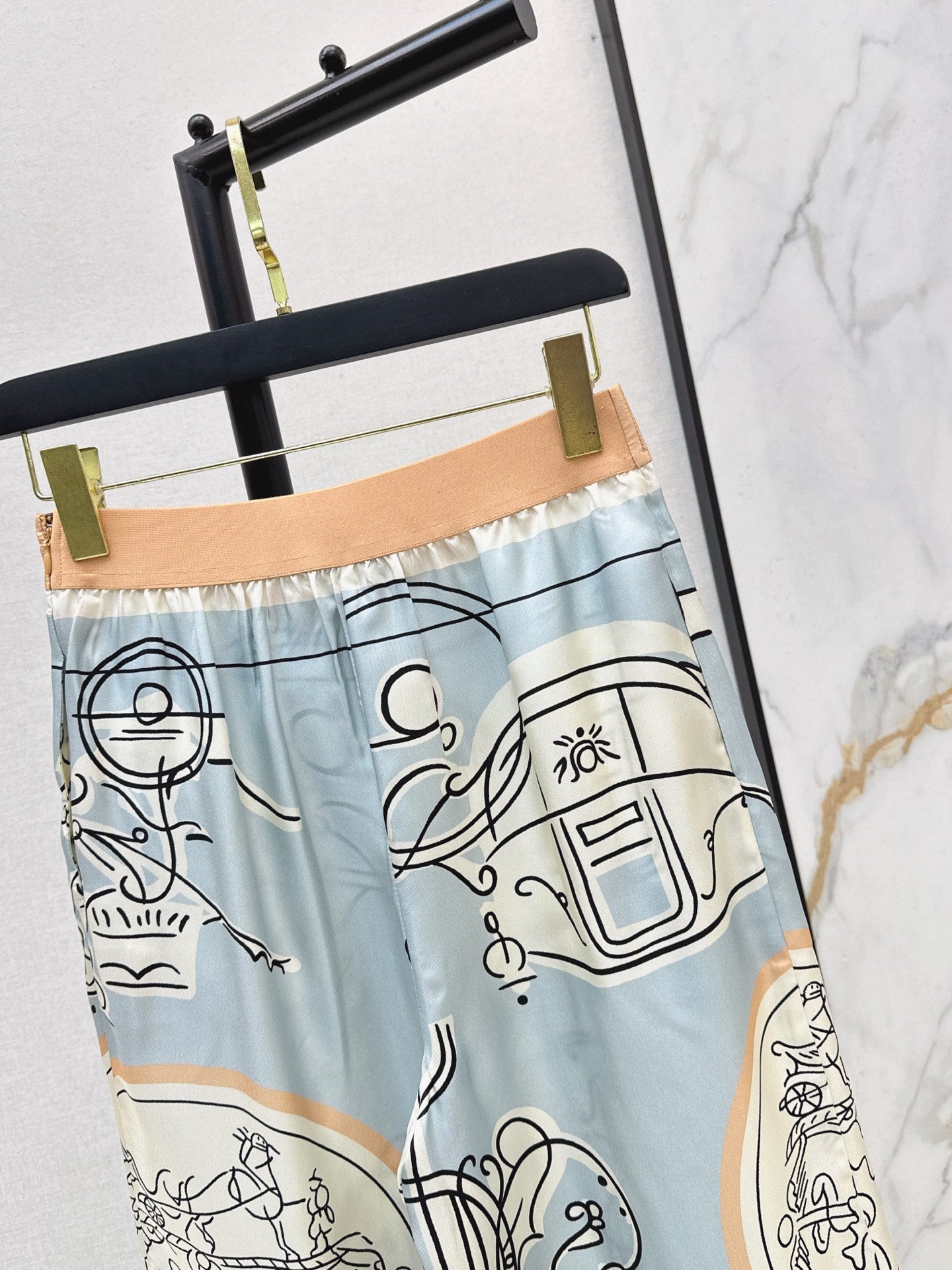 Herm NEW print wide-leg pants