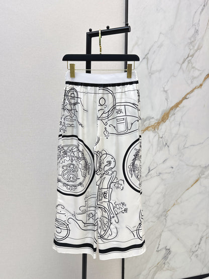 Herm NEW printed silk wide-leg trousers